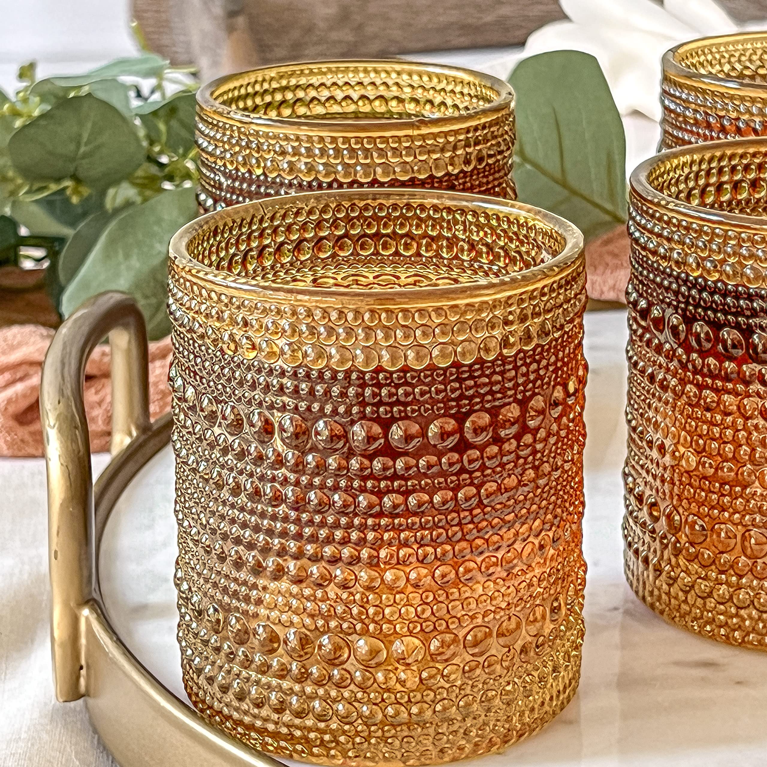 Kate Aspen amber drinking glasses set with cocktails for a polished table setting