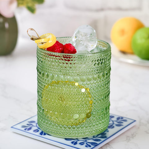 Kate Aspen Sage Green Glasses shown on a stylish bar cart for entertaining.
