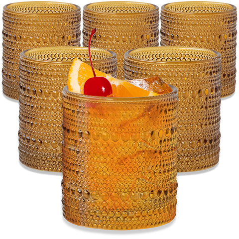 Kate Aspen beaded amber drinking glasses close-up highlighting the intricate ribbed texture for elegant entertaining