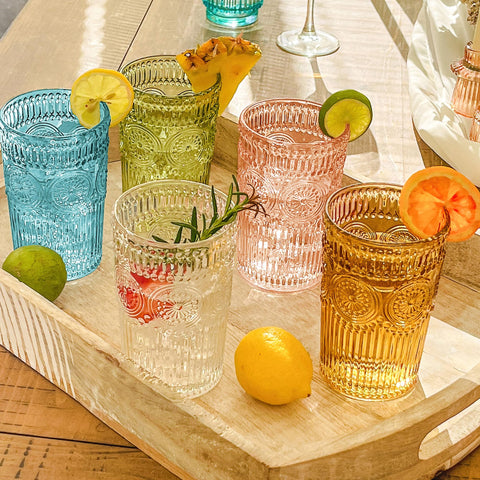 Aqua glass on bar display for colorful table styling.
