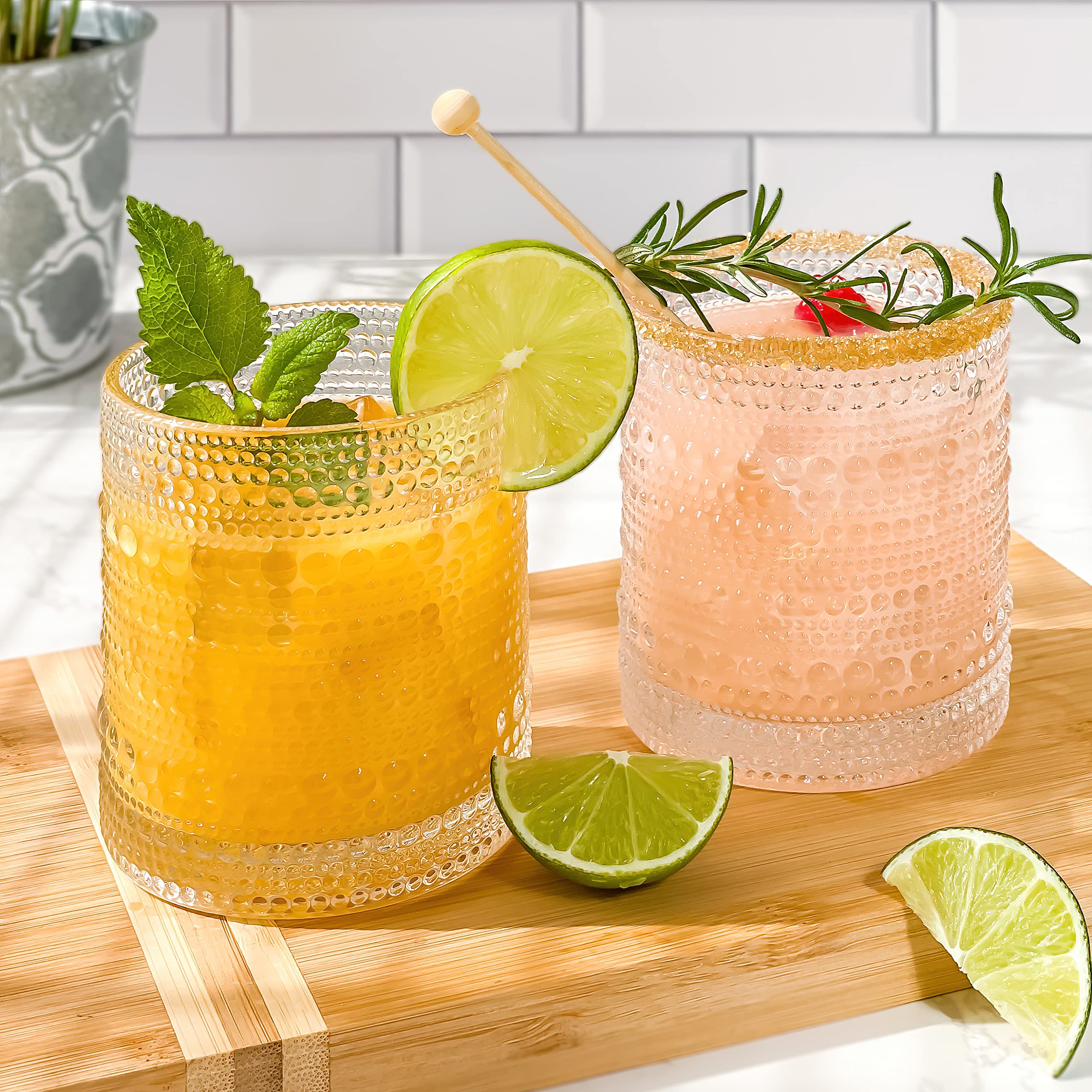 Glasses on a bar cart from Kate Aspen, ready for entertaining.