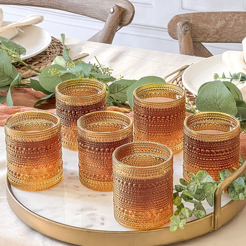 Kate Aspen Jupiter amber glasses showcased for weddings and host gifts
