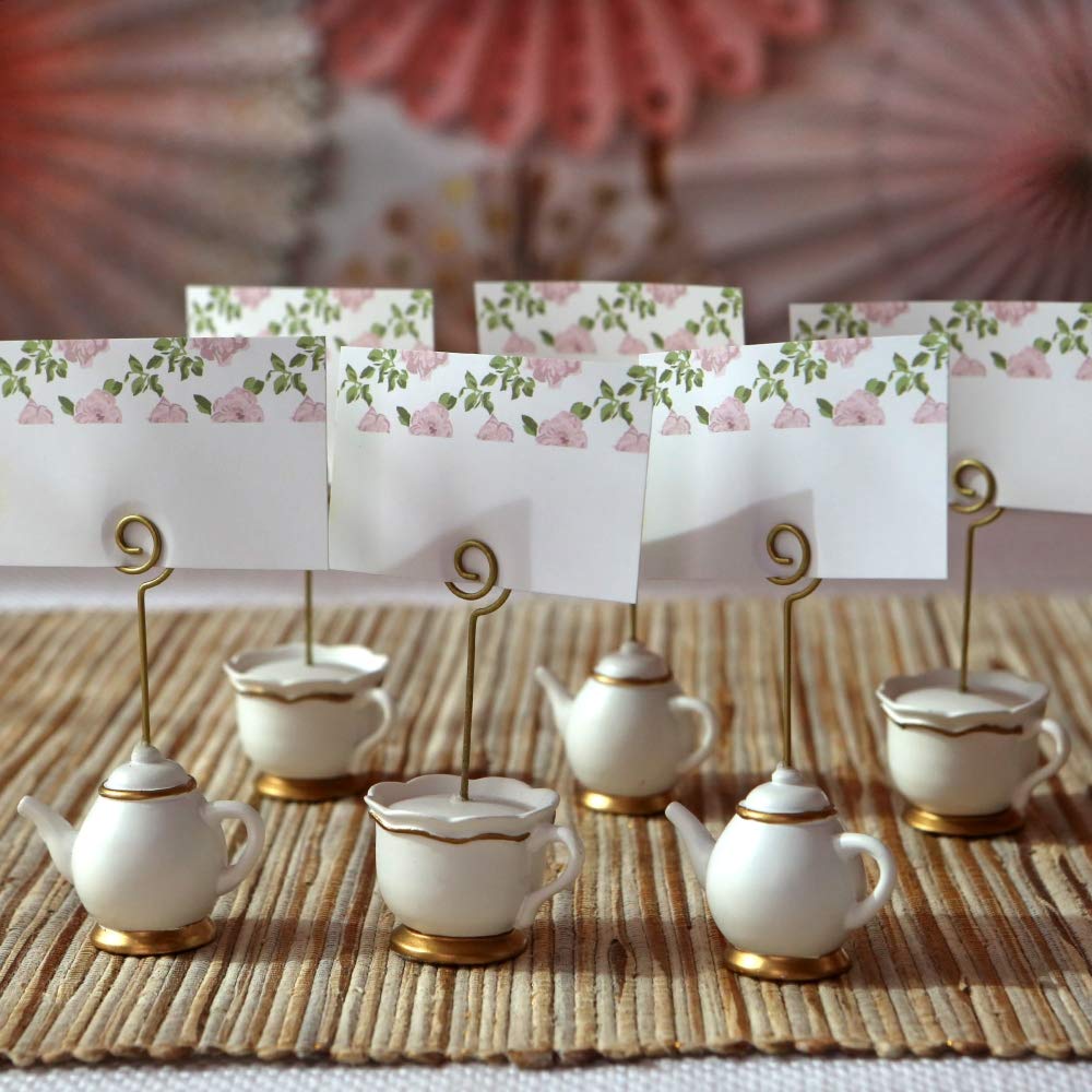 Close-up of teapot card holder with gold stem by Kate Aspen