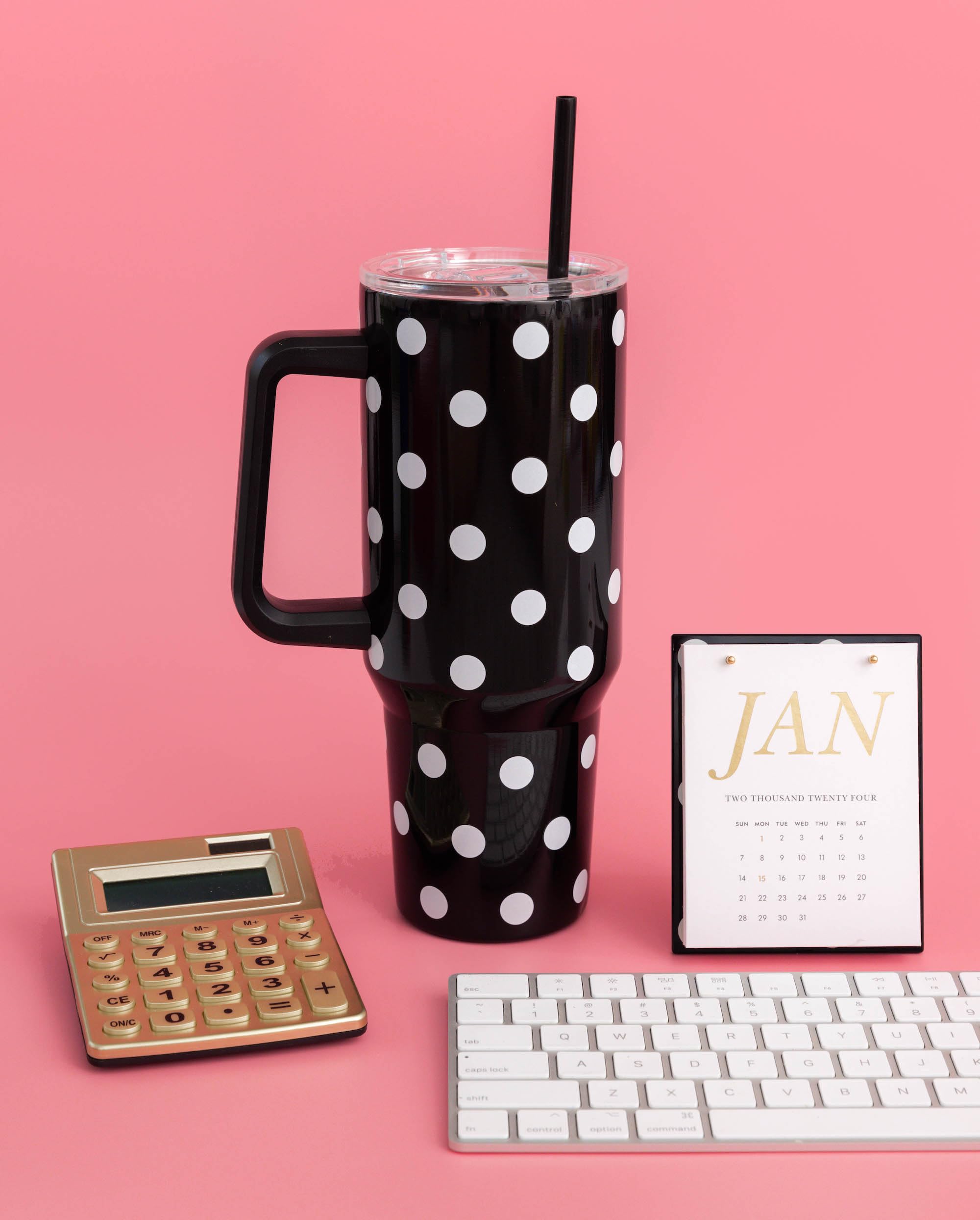 Kate Spade New York polka dot design tumbler with gold logo for stylish daily use