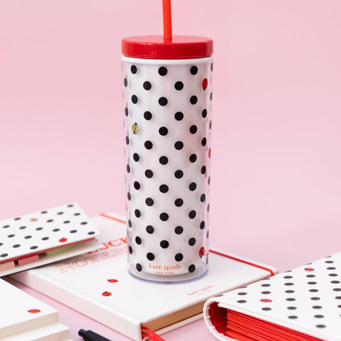 tumbler in hand showing slim cupholder fit for easy commuting.
