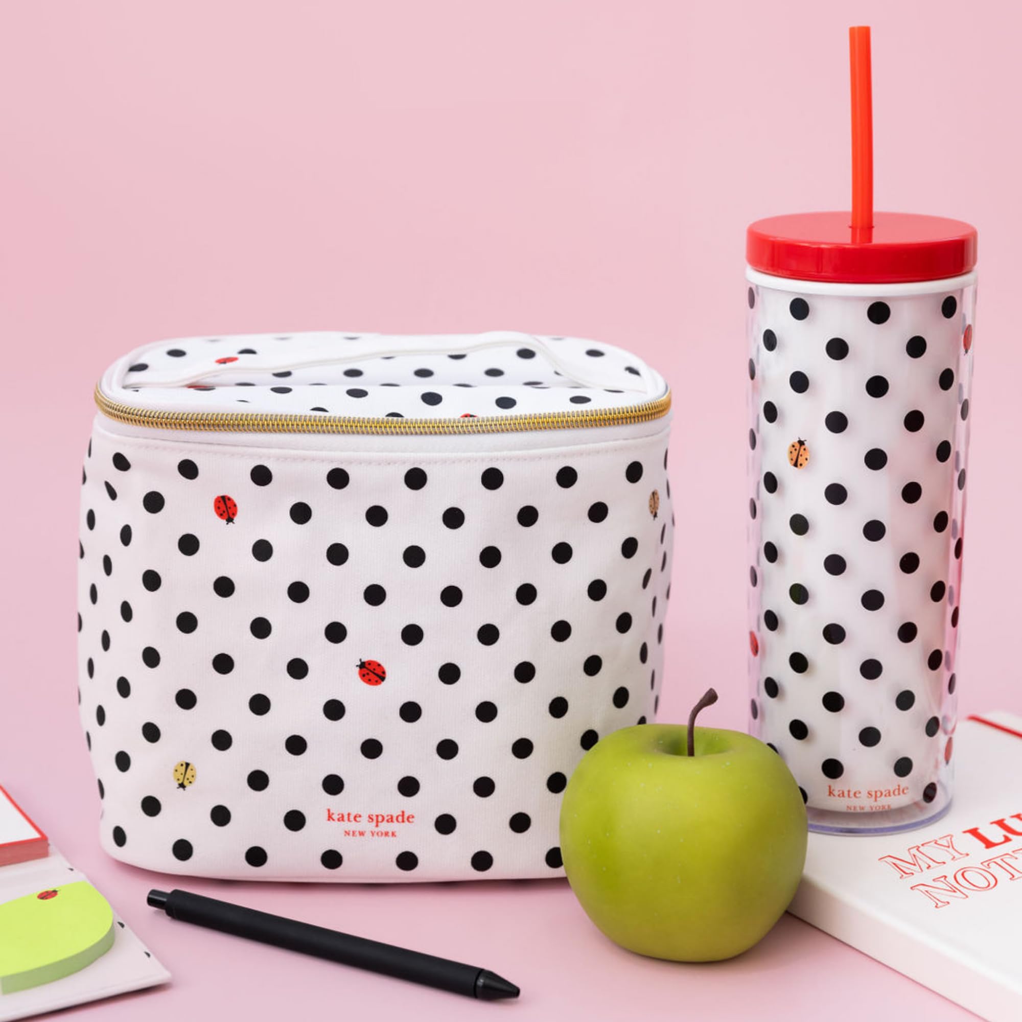 kate spade new york tumbler logo near base for premium branding.