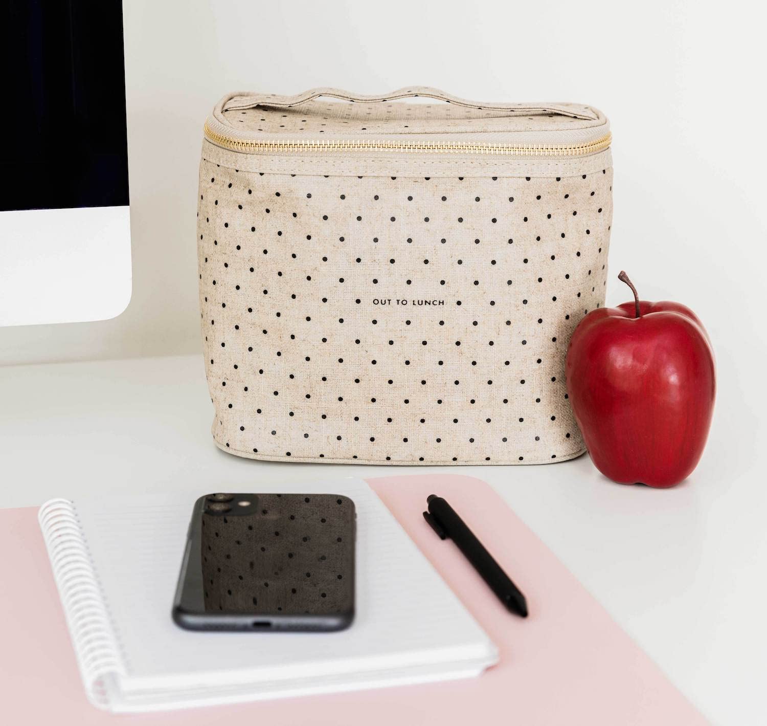 Kate Spade New York insulated tote with wipeable interior for quick cleanup
