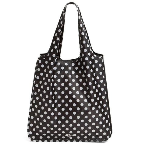 kate spade new york reusable tote with black dots, folded for compact storage