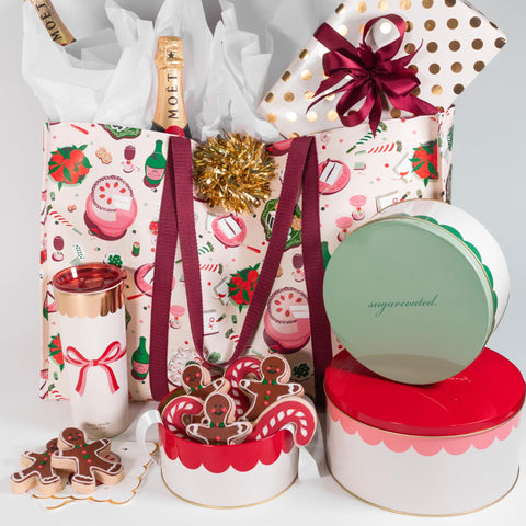 kate spade new york decorative tins on display add holiday cheer to countertops.