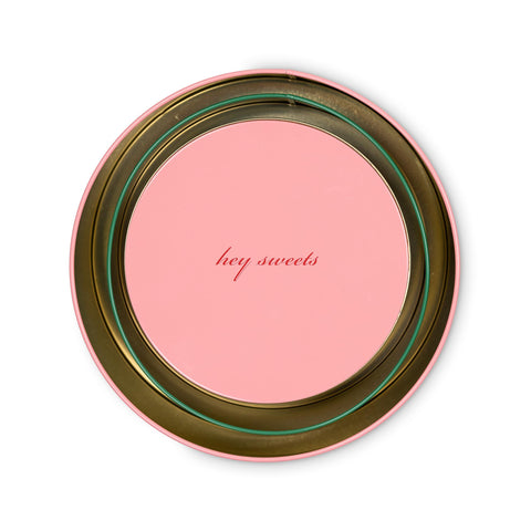 kate spade new york decorative tins holiday designs in vibrant colors elevate kitchen decor.