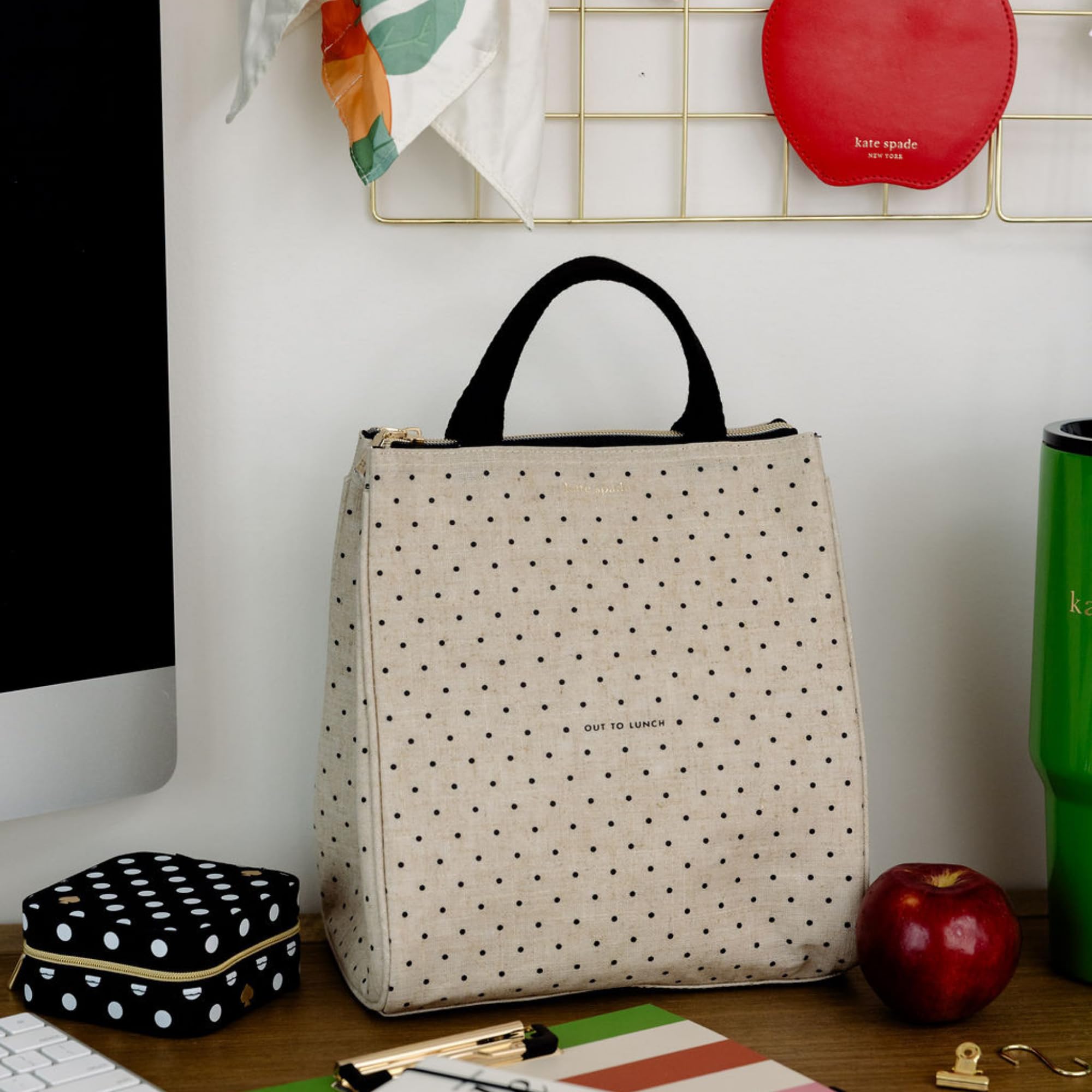 kate spade new york travel-ready design, lightweight and easy to slip into a tote