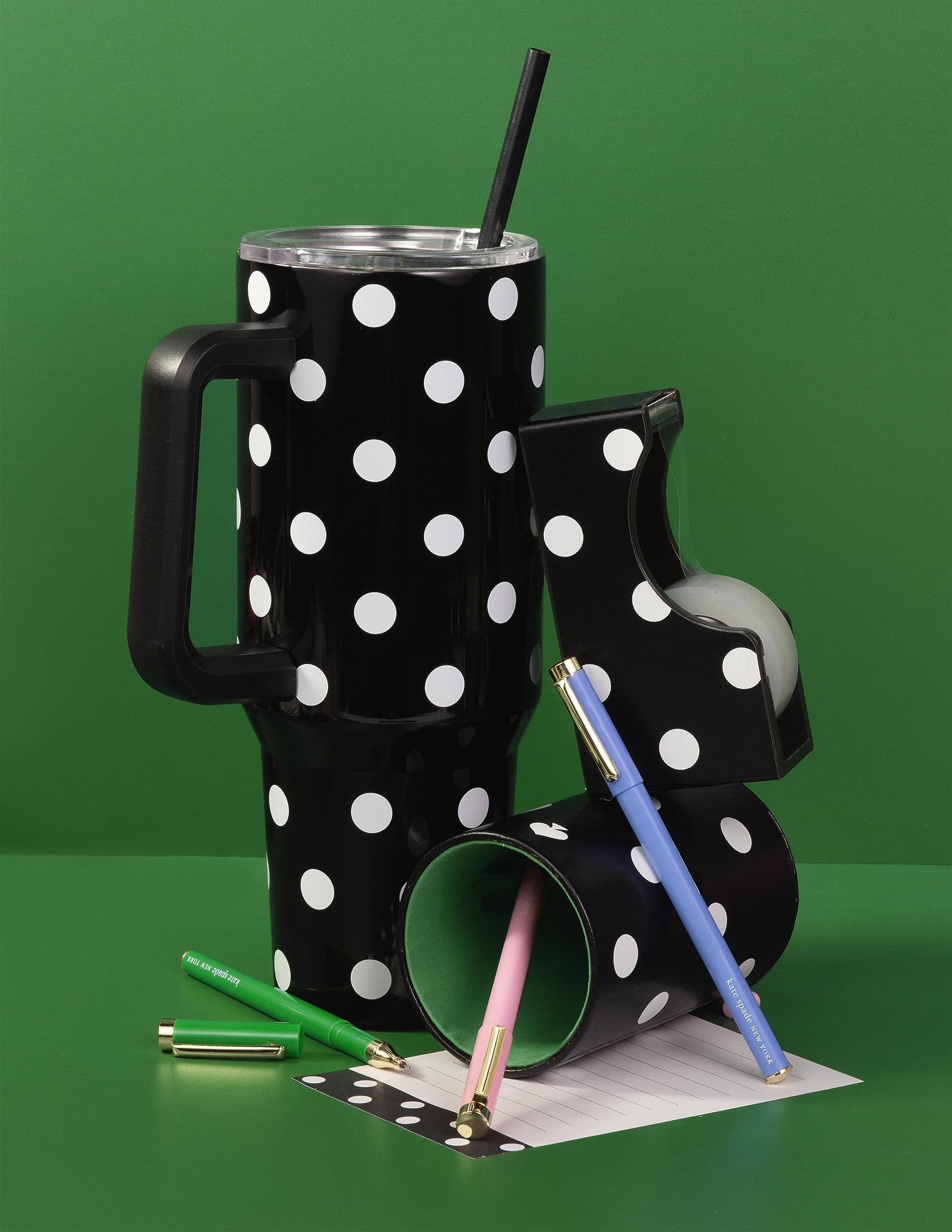 Kate Spade New York tumbler in a cupholder showing its slim base and portability