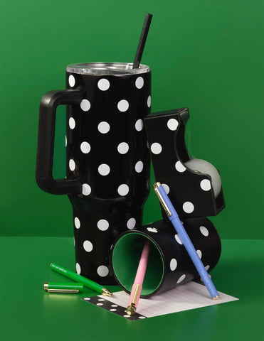 Kate Spade New York tumbler in a cupholder showing its slim base and portability
