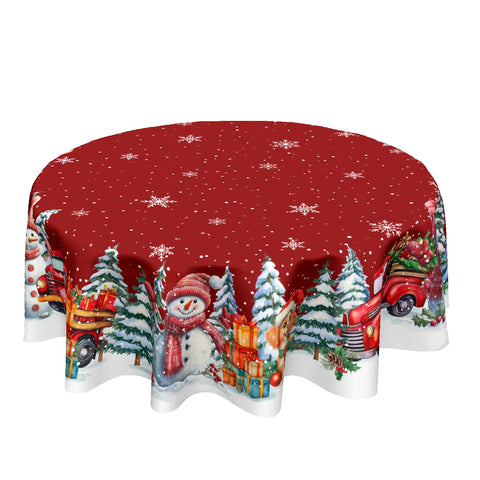 Kawani round tablecloth with red snowman pattern adds festive warmth and easy cleanup.