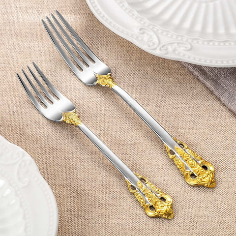 KEAWELL dinner fork with gold accent adds a touch of elegance.
