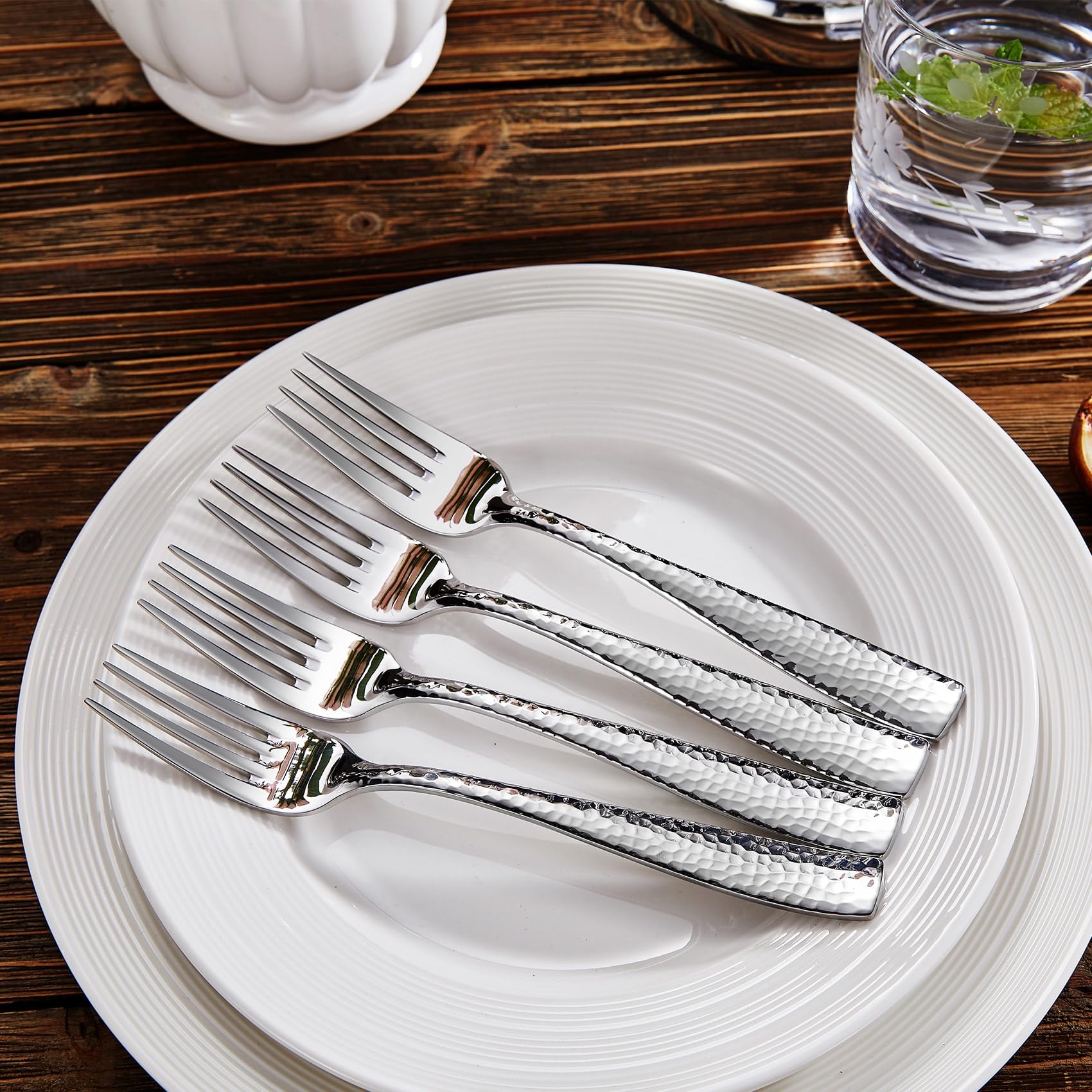 KEAWELL 7-6-inch hammered salad fork on table with smooth edges for comfort.