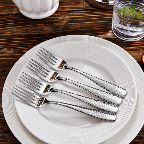 KEAWELL 7-6-inch hammered salad fork on table with smooth edges for comfort.