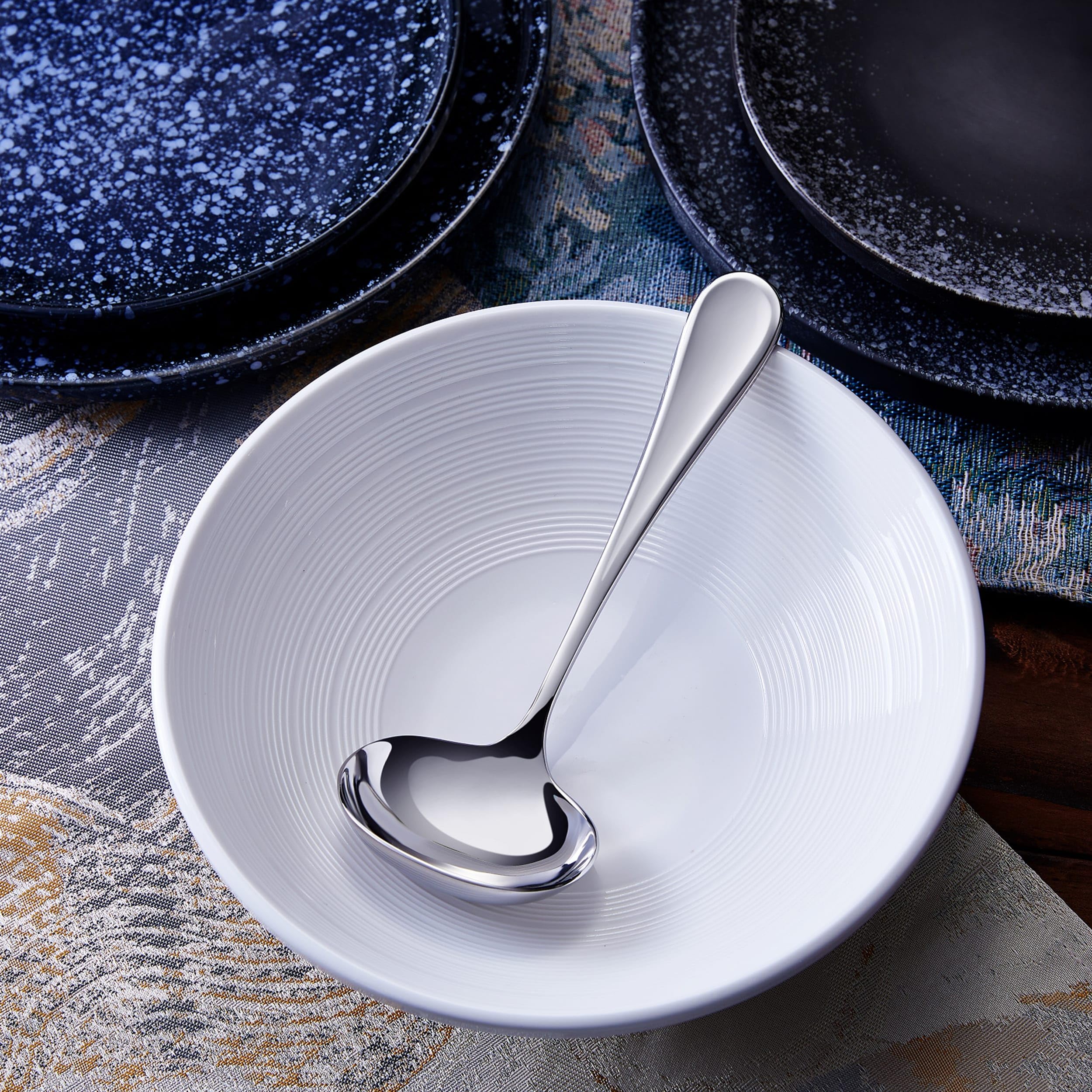 KEAWELL Verona ladle featuring an ergonomic handle for comfortable pouring.