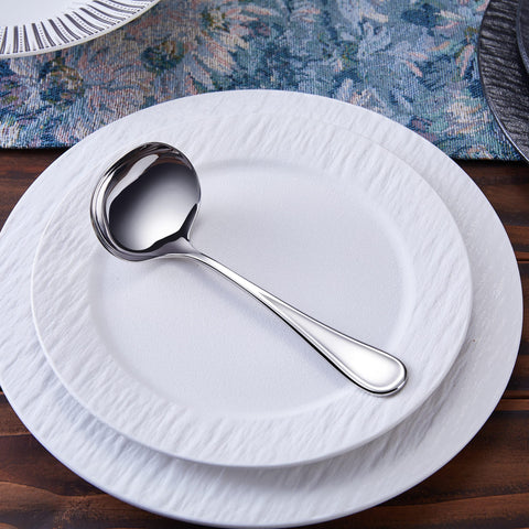 Verona gravy ladle with a high-polish finish for an elegant table presentation.