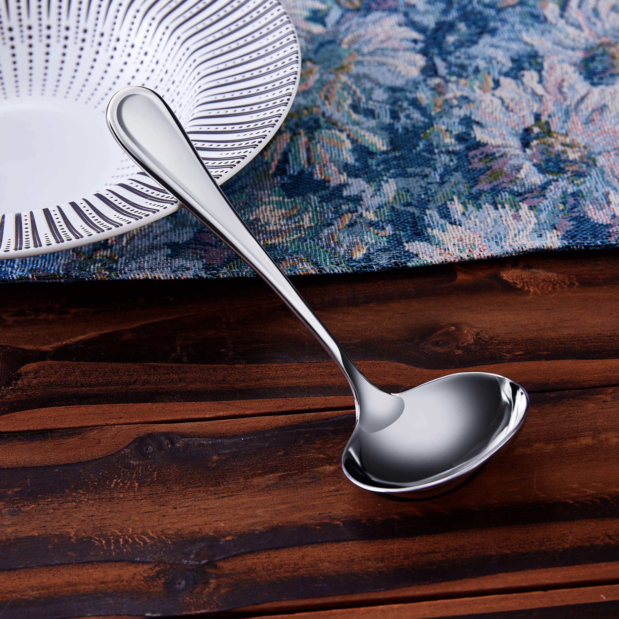 Verona ladle displayed in a stylish storage caddy for organized kitchen use.