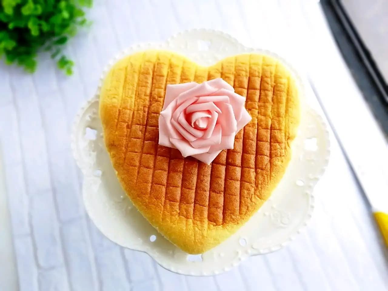 kefyixc heart-shaped cake pan, in-use shot, non-stick coating aids clean releases.