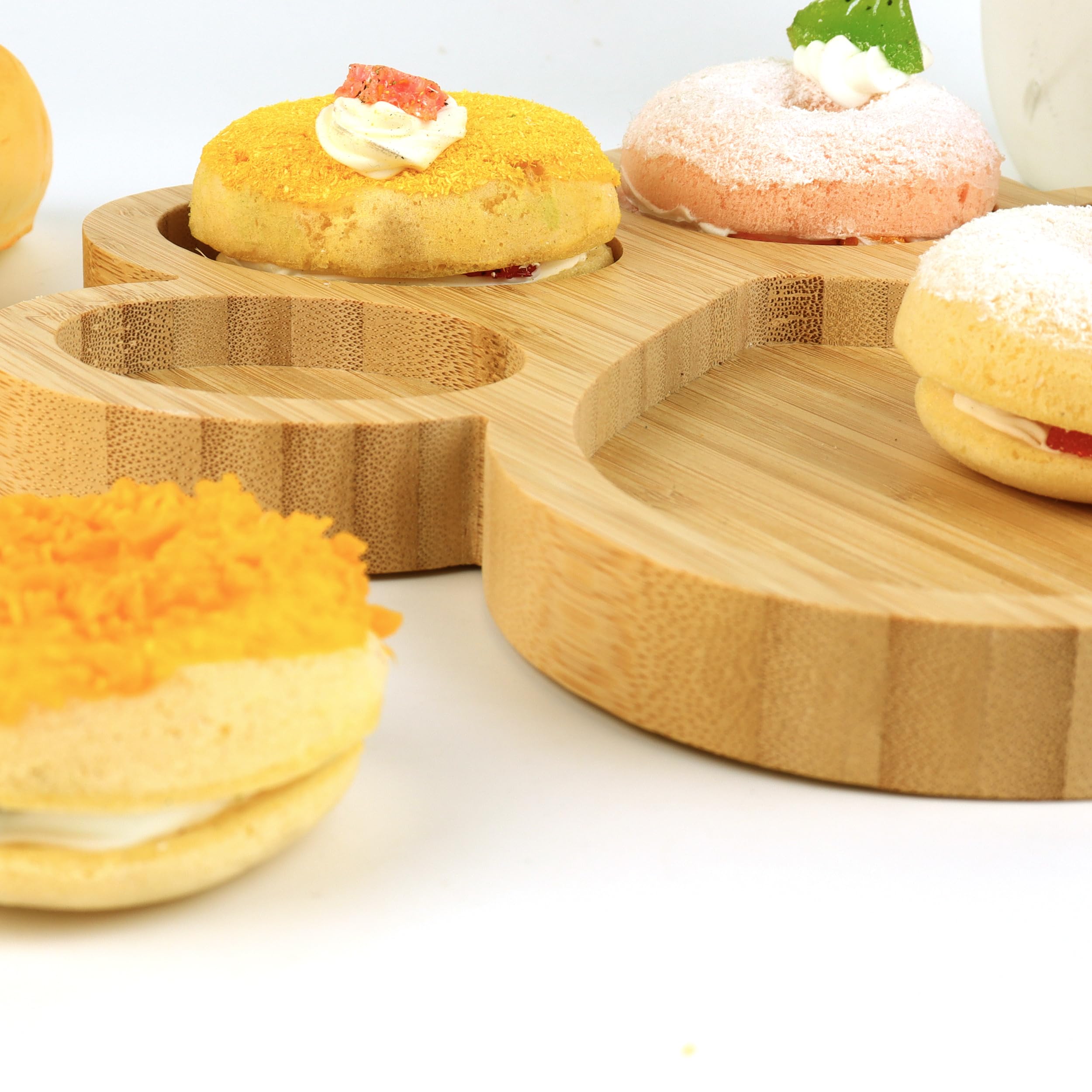 KEPATO bamboo paw tray enhances display of crackers and cheeses.