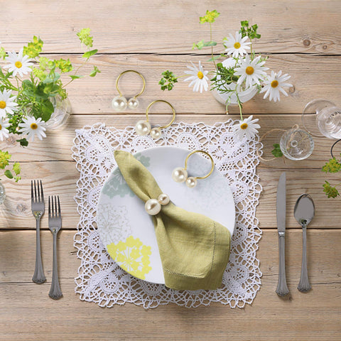 Kesote pearl napkin rings on a holiday dinner setup