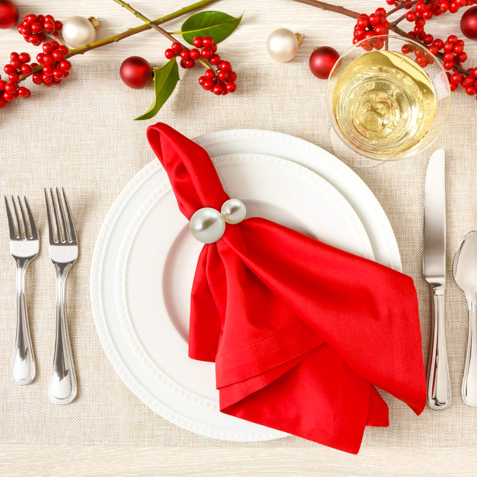 Kesote pearl napkin rings paired with a wedding table centerpiece