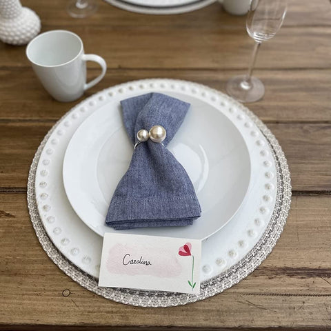 Kesote pearl napkin rings close-up in silver finish showing lustrous shine.