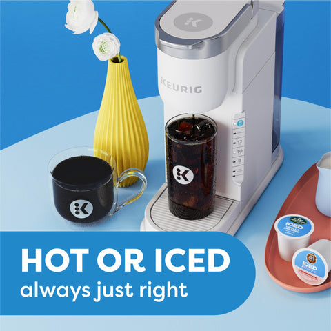 Keurig K-Iced brew-over-ice button in action for perfectly balanced iced coffee.