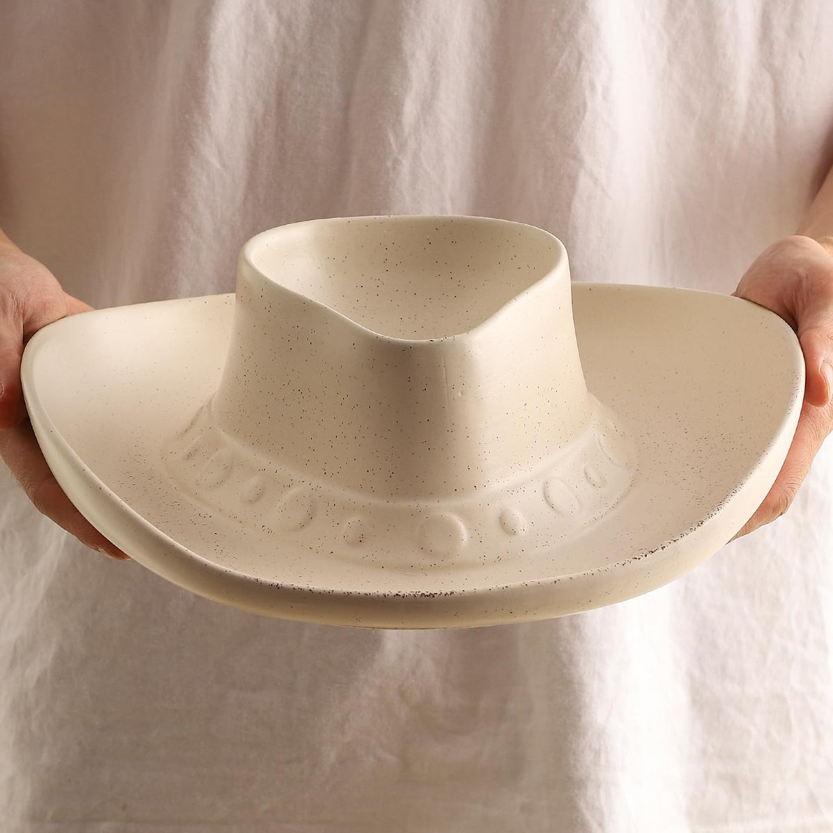 KGCCIZI cowboy hat chip and dip bowl makes a playful centerpiece for entertaining.