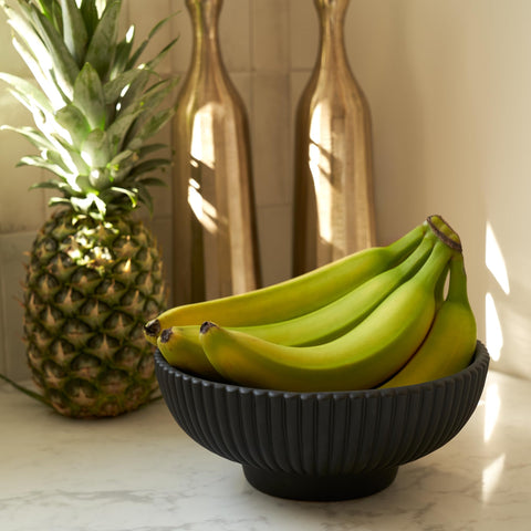 KIBAGA concrete fruit bowl on table as centerpiece; textured finish