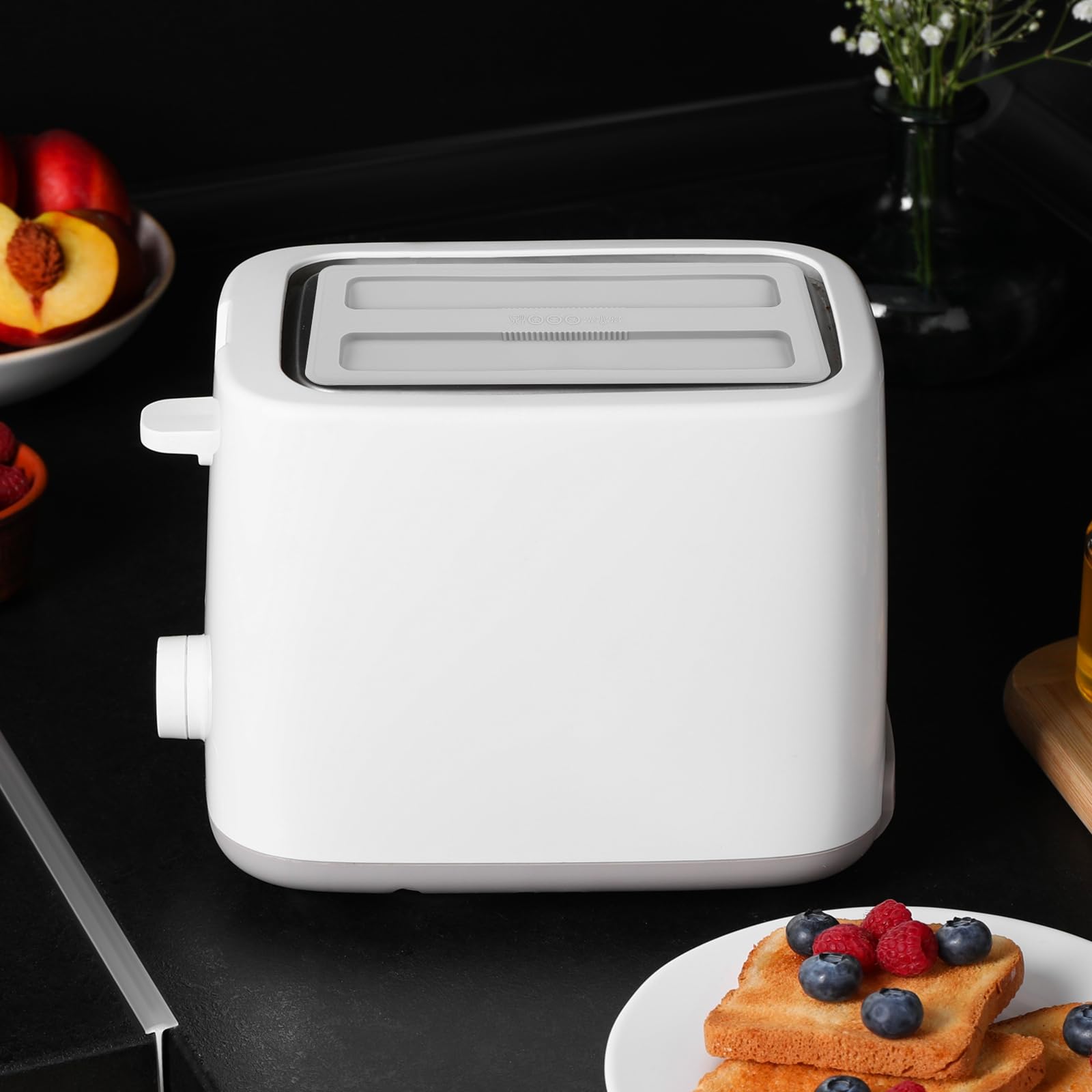 Kichvoe 2-slice toaster cover fits most models and reduces fingerprint marks.