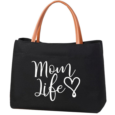 Kifasyo Mom Mama Bag in white canvas shows durable, easy-care material for daily use.