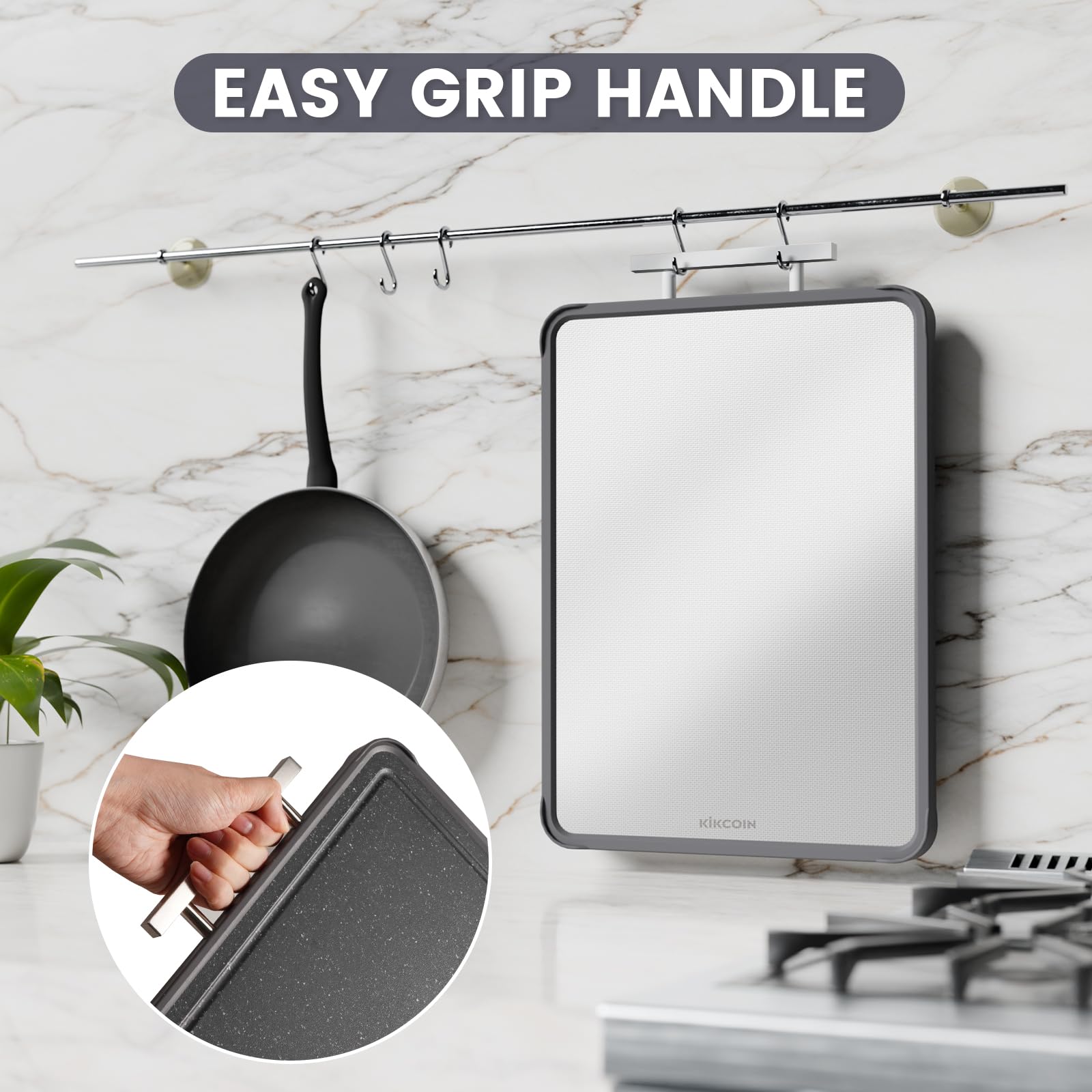 Kikcoin cutting board with hanging handle for space-saving storage.