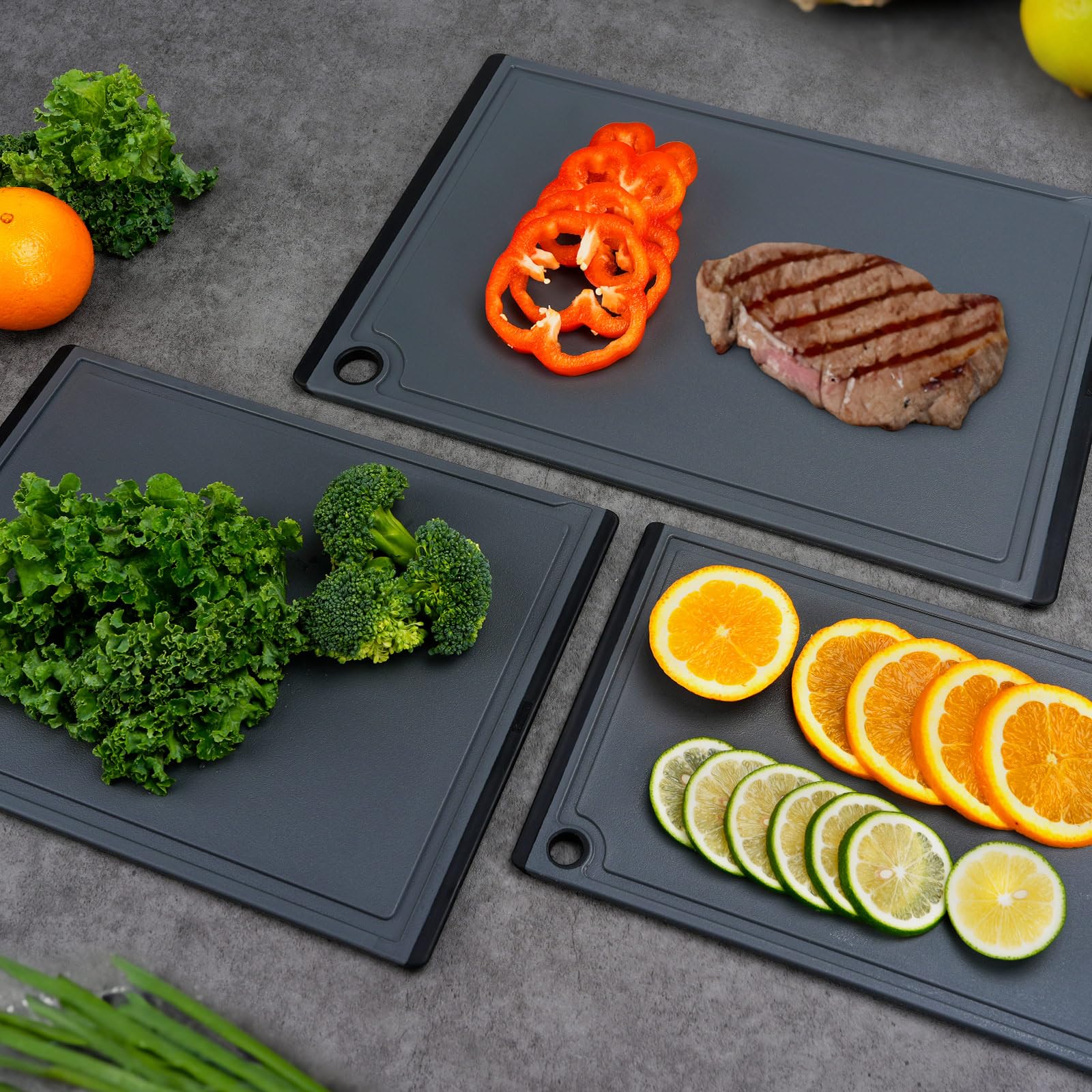 Kikcoin cutting board set featuring rubber feet for a secure grip.