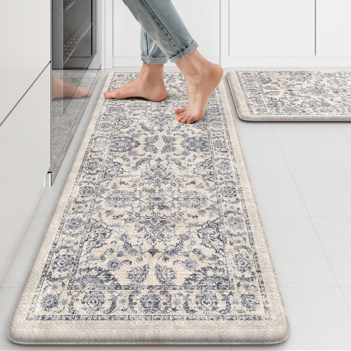 Kimode anti-fatigue kitchen mat beside the sink with blue floral pattern for comfort