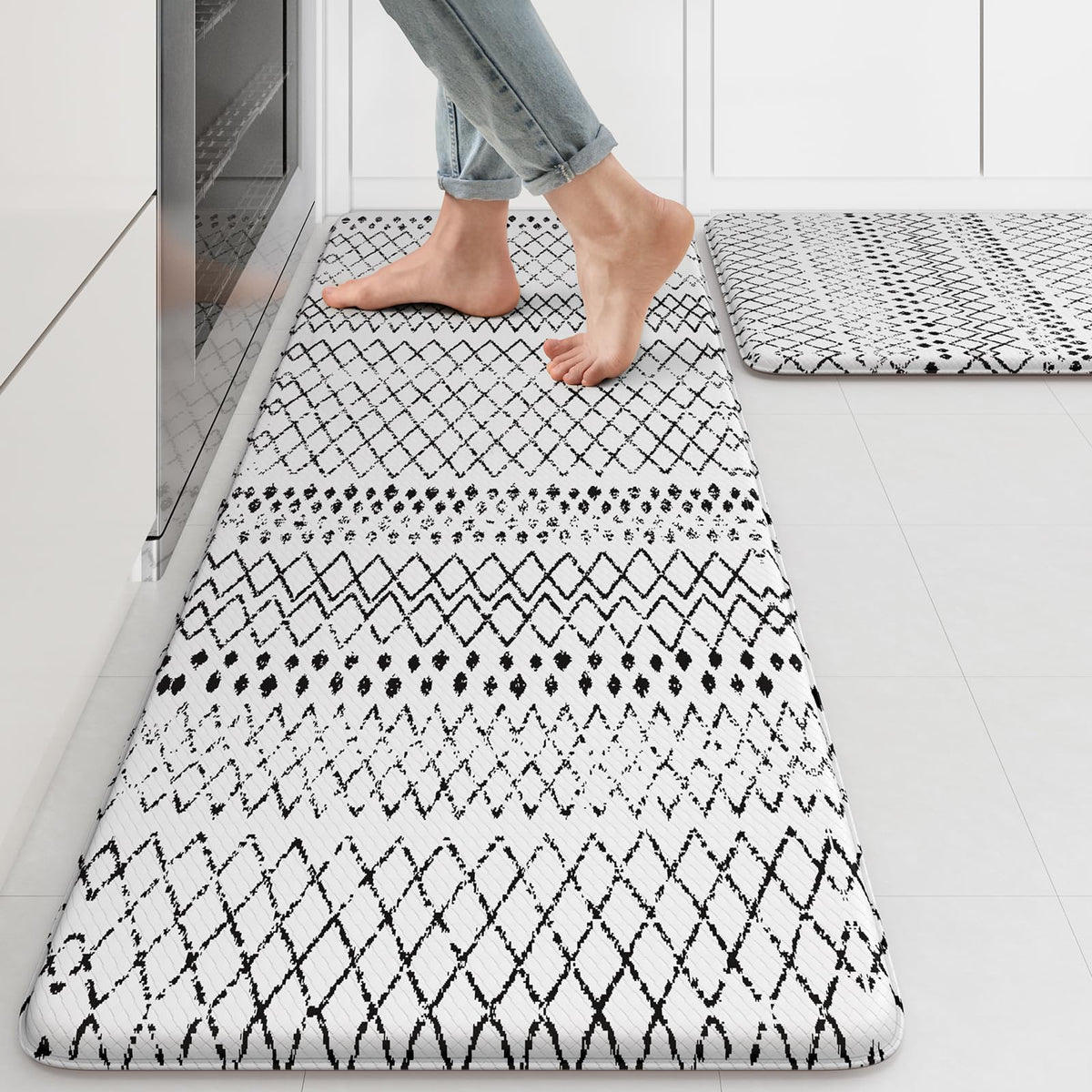 KIMODE 2PC kitchen mats on floor with cushioned comfort for standing.
