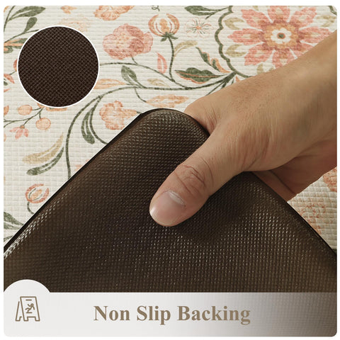Kimode non-slip rubber backing image demonstrates safety on slick kitchen floors.