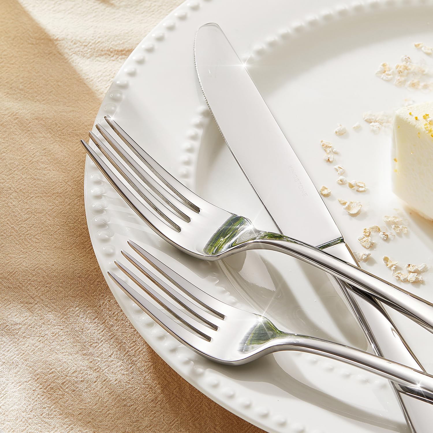 Kingstone flatware modern design handle; sleek profile elevates table settings.