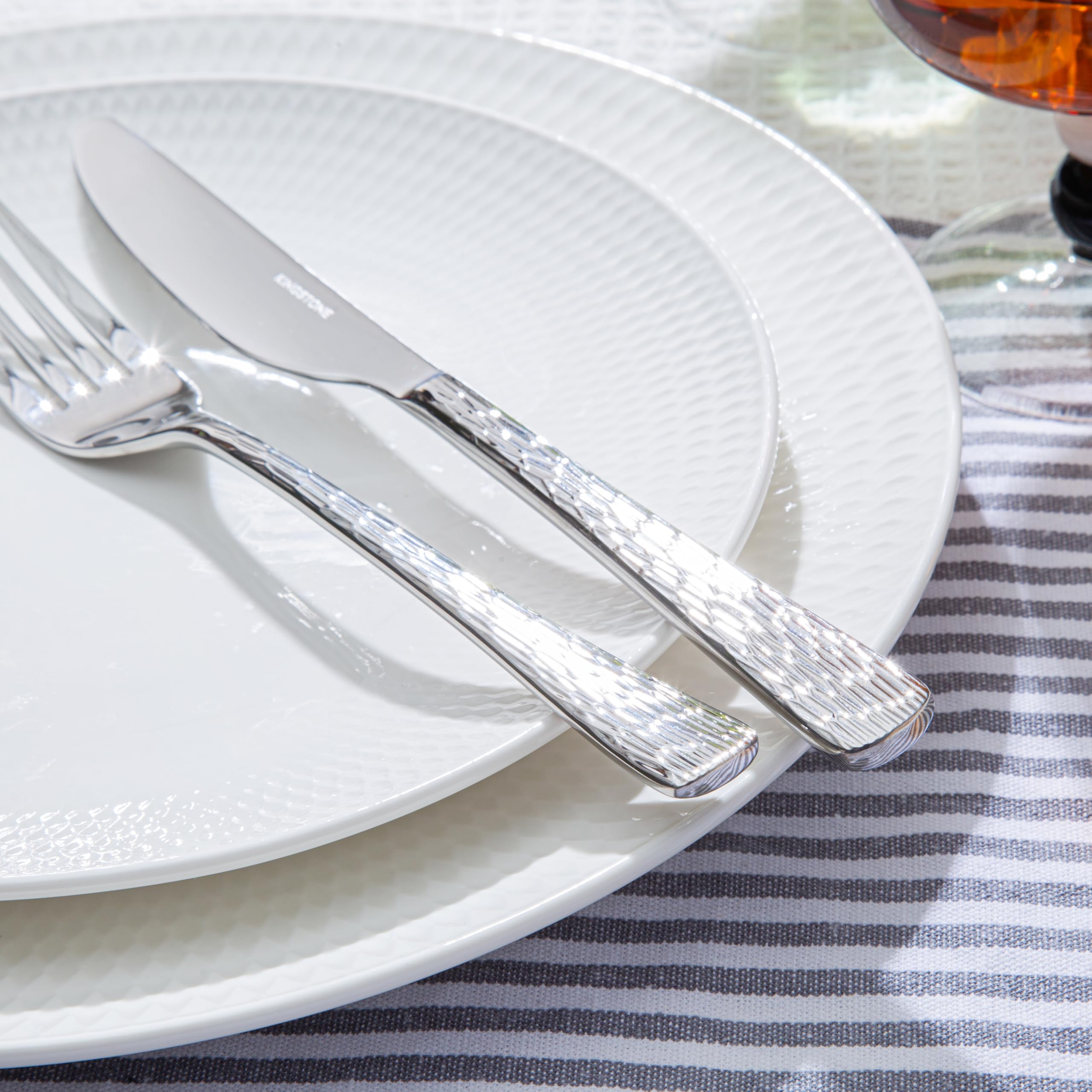 Kingstone hammered silverware set ripple-design close-up highlighting artisanal texture