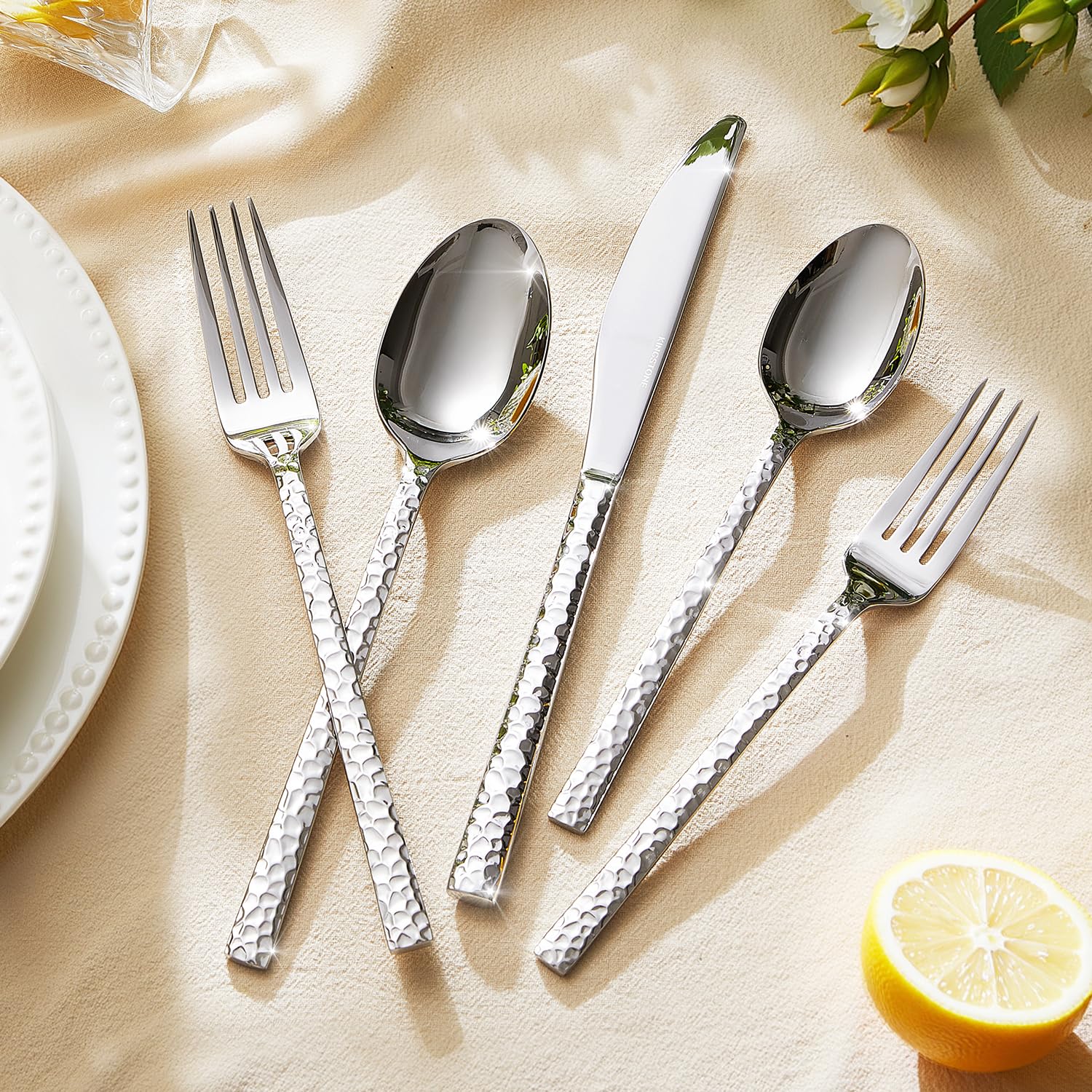 Kingstone hammered silverware trapezoid handles closeup shows comfortable grip.