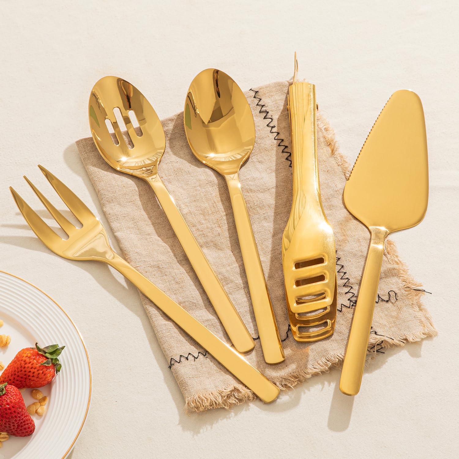 Kingstone Hostess Gold serving spoon close-up with balanced weight for comfortable use.