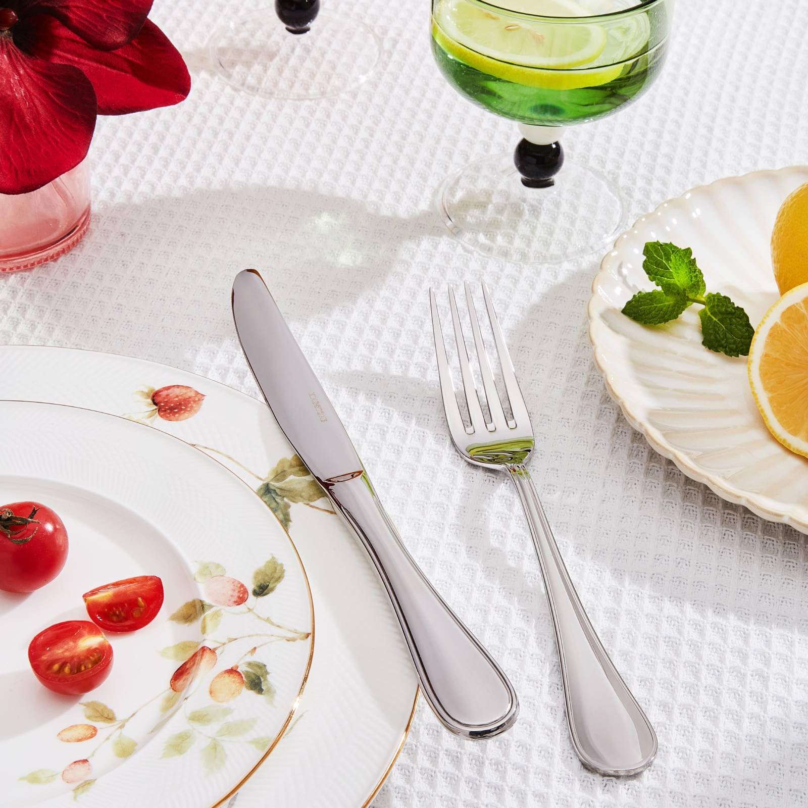 Kingstone teardrop dinner spoons with polished surface for elegance.