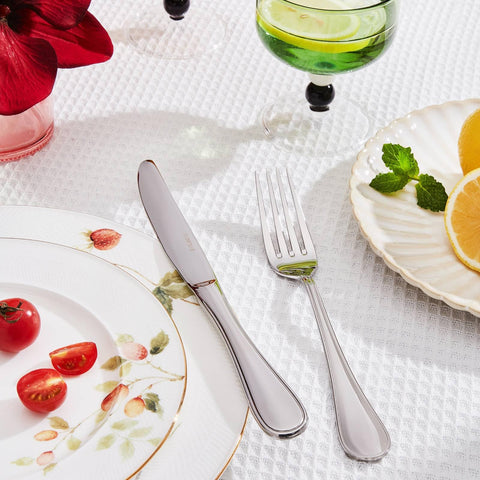 Kingstone teardrop dinner spoons with polished surface for elegance.