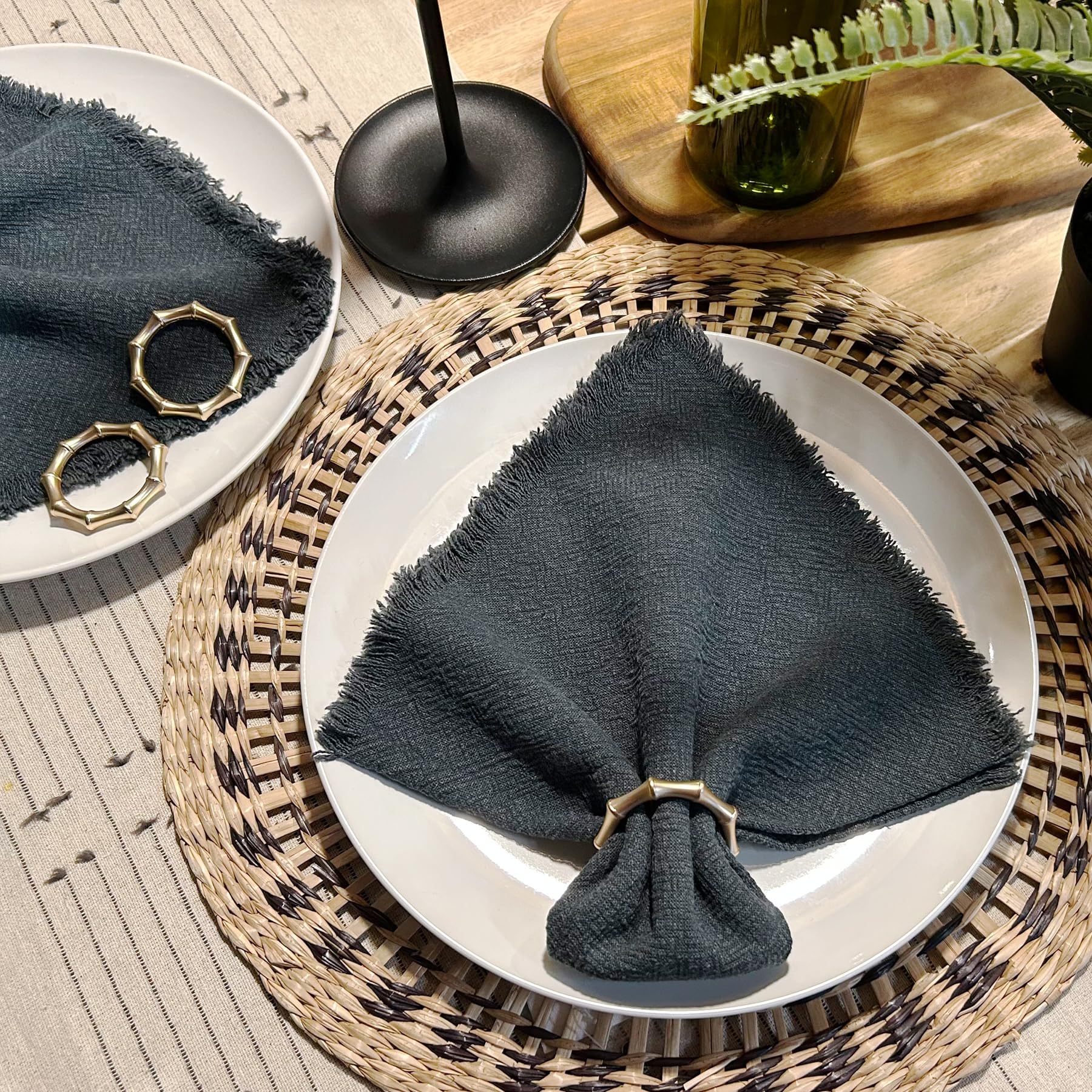 Kintyno twelve-piece napkin ring set arranged for elegant wedding table decor.
