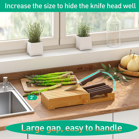 Kiplant drawer storage open slot demonstrates easy access to knives.