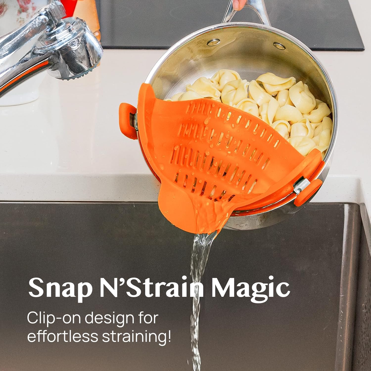 Kitchen Gizmo adjustable silicone colander provides hands-free drainage during cooking.