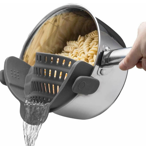 Kitchen Gizmo Snap N' Strain clips onto pots for hands-free draining.