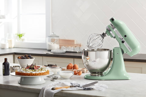 KitchenAid Artisan tilt-head mixer showcasing 10 speeds for versatile recipes